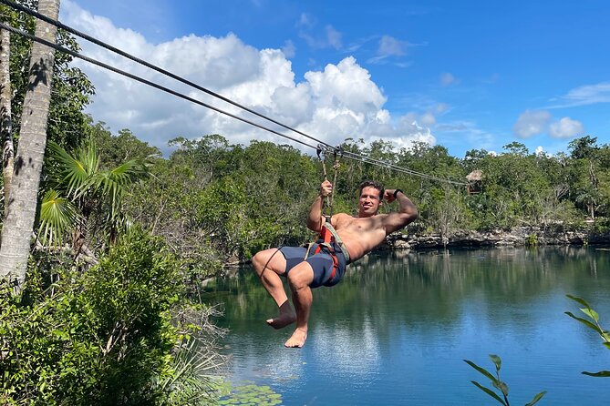 4 Private Cenotes, Zip-Lines, Canoes & Mayan Village with Delicious Lunch - Zip-lines over the jungle canopy