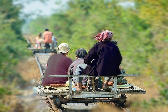 Afternoon tour to Original Bamboo train. Bat cave. Killing cave - Villages, farms, pagodas, and the suspension bridge