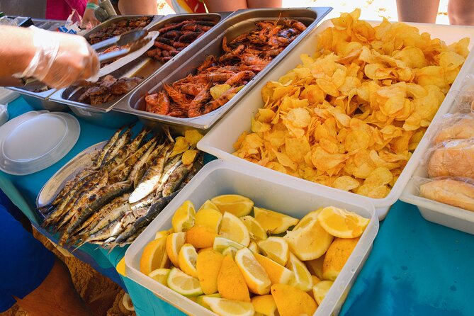 Albufeira Beach BBQ with Caves and Coastline Cruise with Open Bar - Cruising from Albufeira toward Nossa Senhora da Rocha