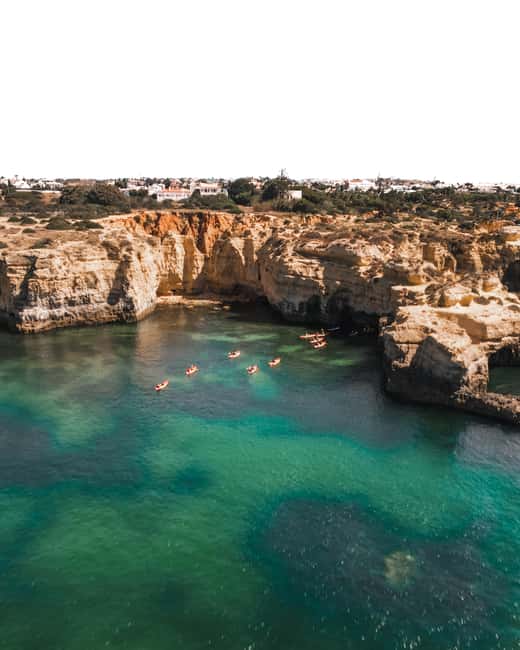 Albufeira: Secret Caves & Beaches Kayak Tour with Swim Stop - Praia da Coelha and the paddle back