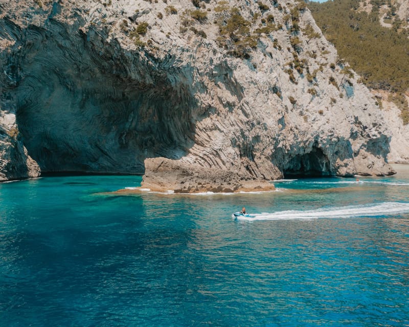 Alcudia: JetSki Tour Coll Baix beach & Caves (free Photos) - Passing the lighthouse island of Alcanada
