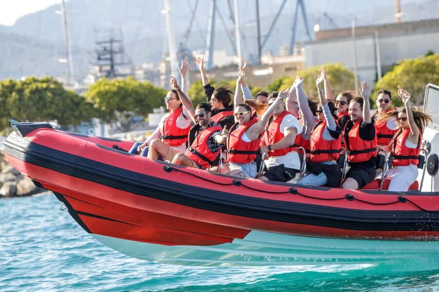 Alcudia: Sightseeing, Sea Caves & Snorkel Speedboat Tour - Passing Aucanada and leaving the port behind
