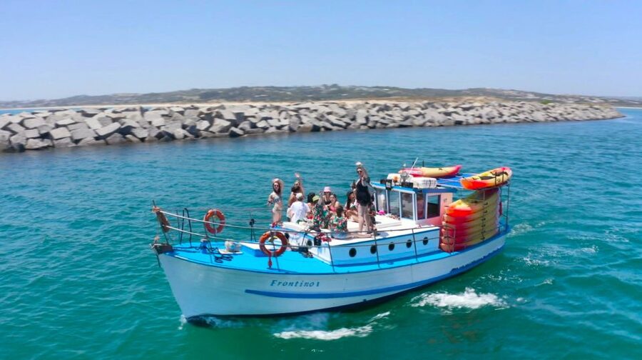Alvor: Explore Caves Boat and Kayak Tour - The secret stop: kayaks, arches, and sea caves