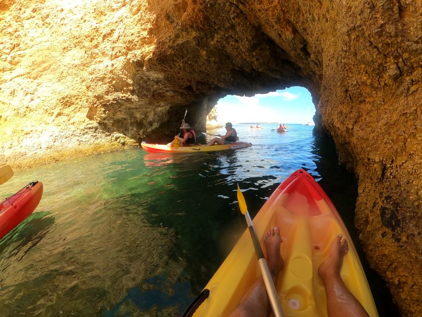 Alvor: Explore Caves Boat and Kayak Tour - Cruising from Alvor toward Praia do Vau