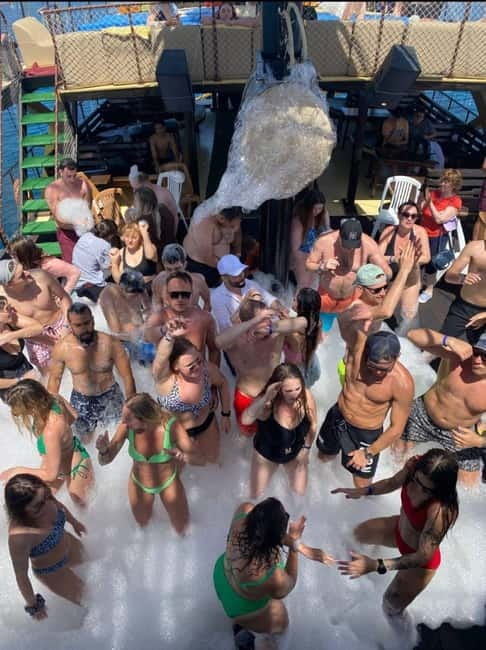 Antalya/Kemer: Boat Tour Visit Caves and Bays With Lunch - The return trip turns into a foam party