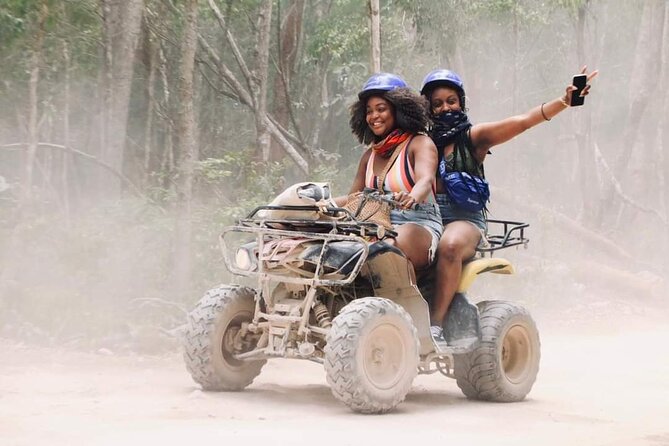 ATV Cenote and Zipline Sacred Jungle Expedition - Riding ATVs through the Mayan jungle