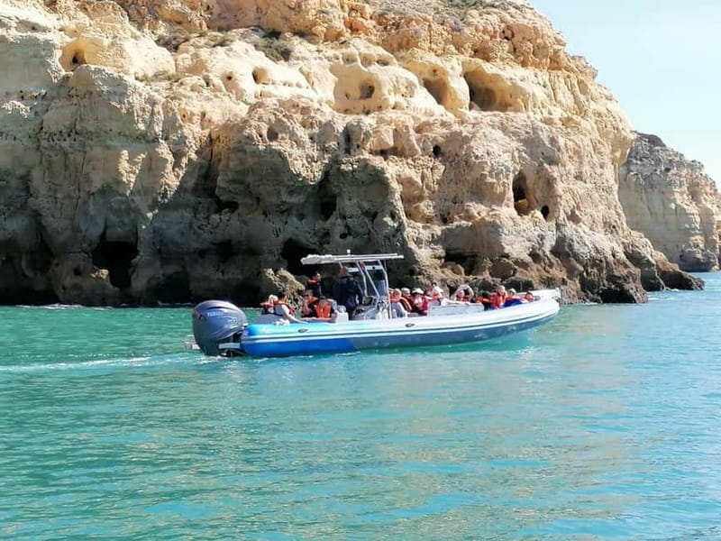 Benagil Caves Full Circuit Happy Hour - Santa Catarina Fort and Ferragudo Castle from the water