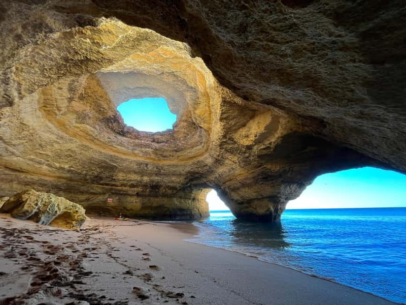 Benagil Kayak Tour: Explore Secret Caves with Licensed Guide - The first caves and cliffs near Albandeira
