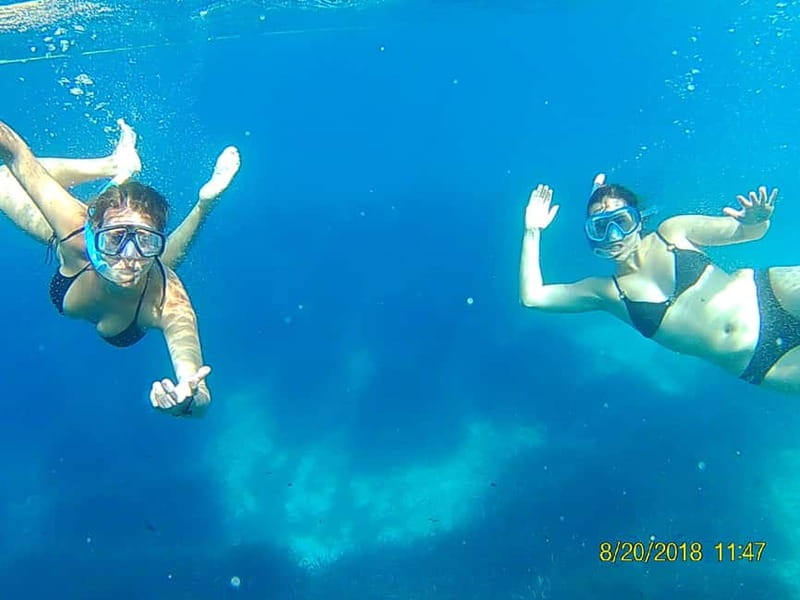 Binibèquer: Kayaking, Caves and Snorkeling Adventure - Entering sa Cova d’es Pont and the smaller caves