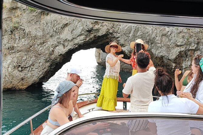 Blue Grotto and Capri Boat Tour with Aperitivo Swim and Snorkel - Punta Carena Lighthouse and the Green Grotto