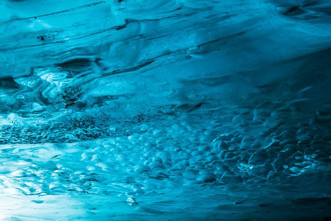 Blue Ice Cave Adventure - Entering an ice cave selected for the day