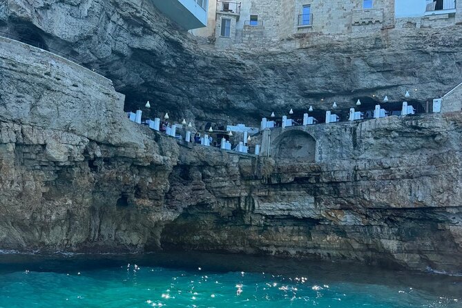 Boat tour from Monopoli to the Polignano caves with aperitif - Scoglio dell’Eremita, the rocky gateway to Polignano