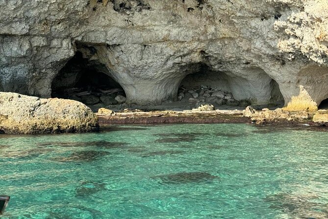 Boat tour from Monopoli to the Polignano caves with aperitif - Grotta Palazzese and the onboard aperitif