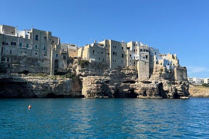 Boat tour from Monopoli to the Polignano caves with aperitif - Leaving Monopoli through the Old Port