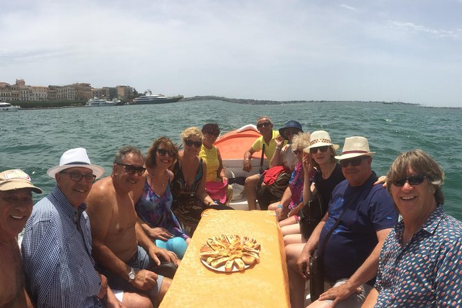 Boat tour of Ortigia Island and sea caves - Circumnavigating Ortigia Island