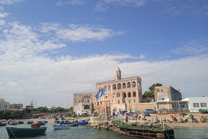 Boat tour of the Polignano a Mare caves with aperitif - Starting at San Vito and the Abbey