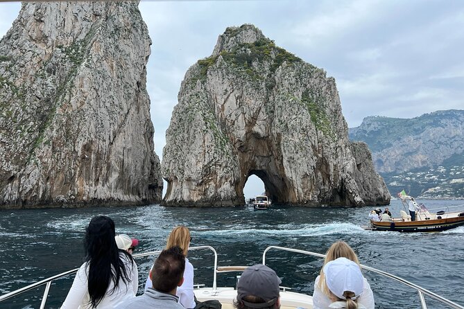 Capri, Blue Grotto by Priority, Faraglioni Swim and City Visit - Caves, cliffs, and the Punta Carena lighthouse