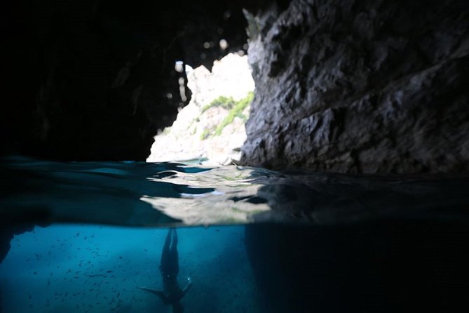 Capri & Blue Grotto Semi Private Boat Day Trip from Sorrento - Grottoes around Capri, seen from the right angle