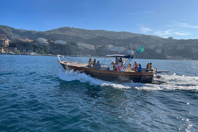 Capri Blue Grotto Small-Group Boat Day Tour From Sorrento - Marina Grande and the Roman villa from the water