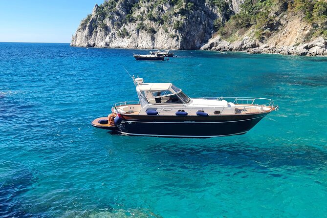 Capri Blue Grotto Small-Group Boat Day Tour From Sorrento - Entering the Blue Grotto near Capri
