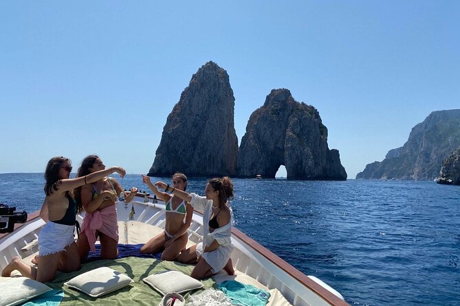 Capri Boat Tour: Grottoes, Swim & Sip Limoncello in a Small Group - Seeing Capri from the sea in two hours