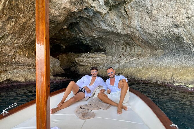 Capri Boat Tour: Grottoes, Swim & Sip Limoncello in a Small Group - Snacks, drinks, and limoncello