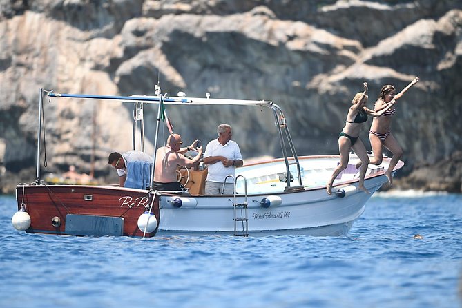 Capri Boat Tour: Grottoes, Swim & Sip Limoncello in a Small Group - Price and value at $72.41