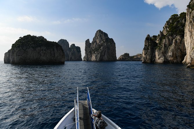 Capri Coast to Coast: Boat Tour with Optional Blue Grotto - Starting at Marina Grande with a map in hand