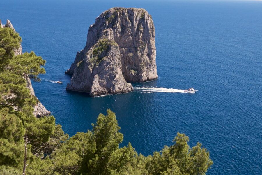 Capri: Guided Island Boat Tour With a Stop at the Caves - Rounding the Faraglioni