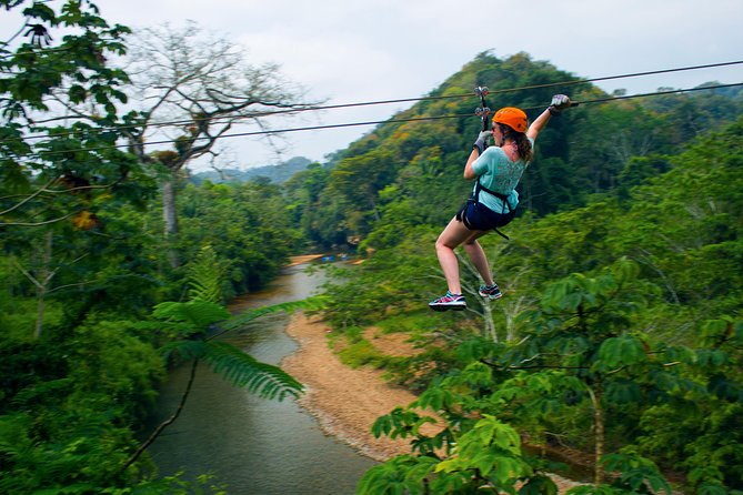 Cave Tubing & Zipline Adventure with Lunch - Seven zipline runs through the rainforest