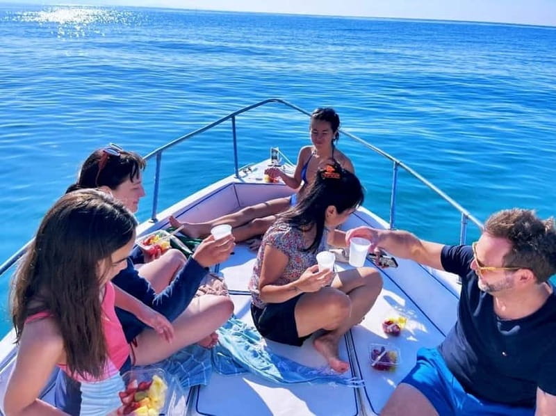 Cefalù: Mini Yacht Tour with Caves, Snorkeling, and Open Bar Aperitif - At a glance