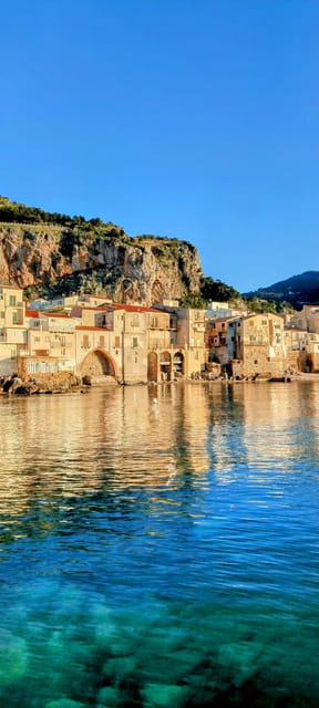 Cefalù: Mini Yacht with Snorkel Stops, Caves and Aperitif - Seeing Cefalù from the deck
