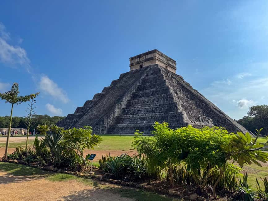 Chichen Itza: Guided Tour with Valladolid & Cenote Chichikan - Walking through Chichen Itza with a live guide