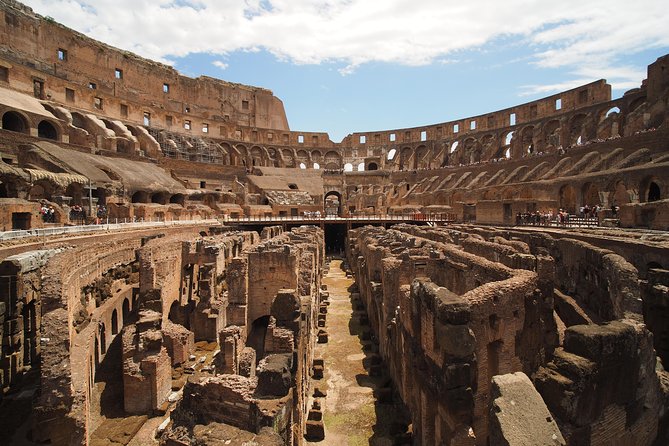 Colosseum Underground & Ancient Rome Guided Tour - Entering the Colosseum arena