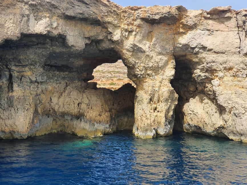 Comino: Blue Lagoon & Caves Boat Cruise - Crystal Lagoon and St. Mary’s Tower on the return