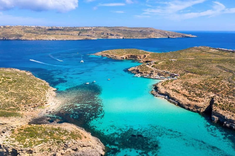 Comino: Blue Lagoon, Crystal Lagoon and Sea Caves Boat Tour - The first cruise and Comino Tower