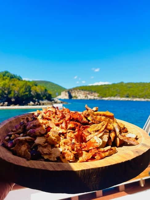 Corfu: Blue Lagoon and Cave Cruise with Drinks and Lunch - Why the wooden boat changes the feel of the day
