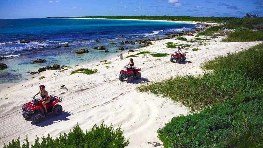 Cozumel: ATV Seashore Adventure & Mayan Cenote Experience - Riding ATVs near Mezcalitos