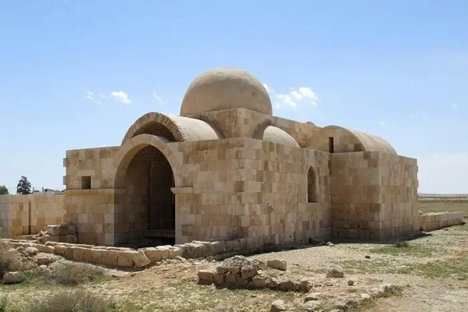 Day Tour To Desert Castles & Cave of the Seven Sleepers - Qsar Al-Azraq and its black basalt walls