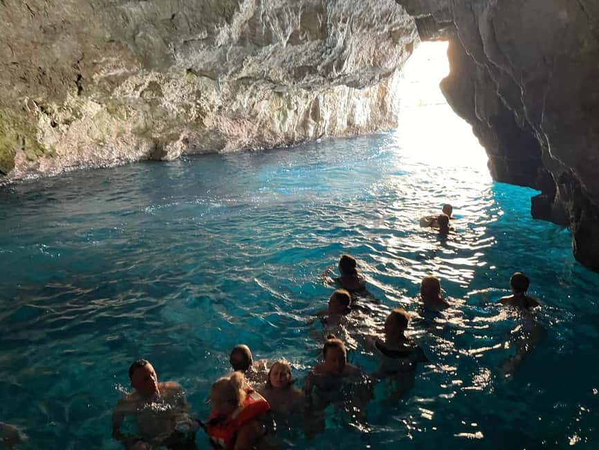 Deluxe excursion from Budva: Blue Cave tour - Entering the Blue Cave near Luštica