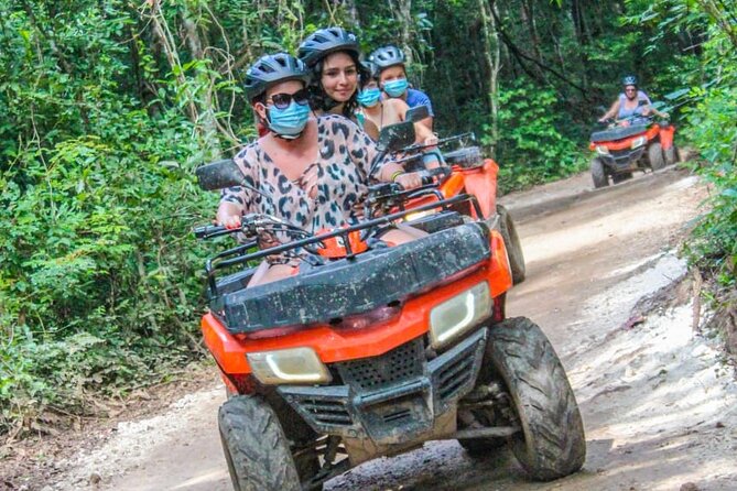 Drive an Atv shared, swim in a Cenote and ziplines in the Cancun - Short ziplines with a beginner-friendly feel