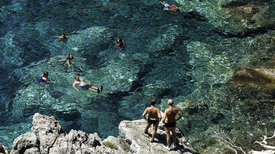 Dubrovnik: Blue Cave Tour with Panoramic Old Town View - Swimming through the Three Green Caves