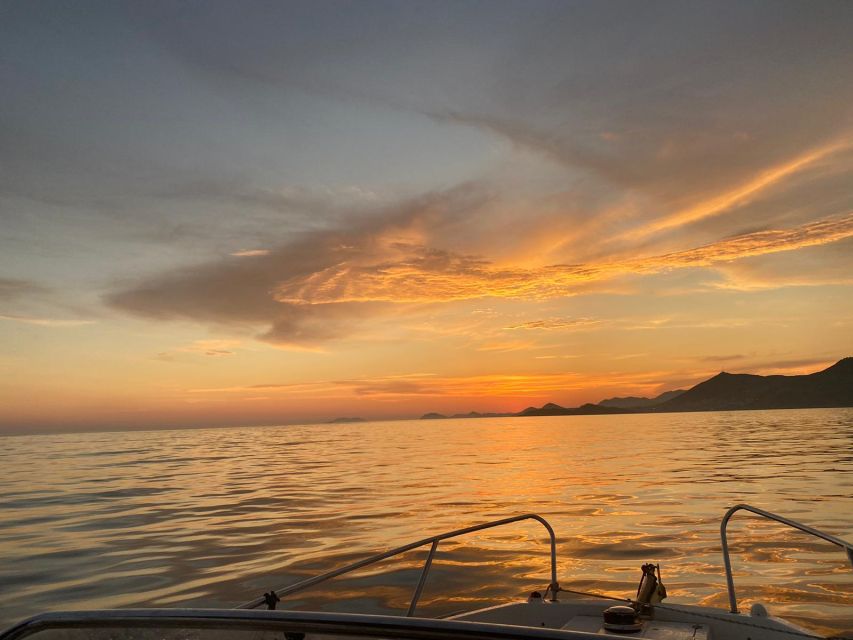 Dubrovnik: Romantic Sunset Cruise & Cave Visit with a Local - Leaving the harbor with Dubrovnik behind you
