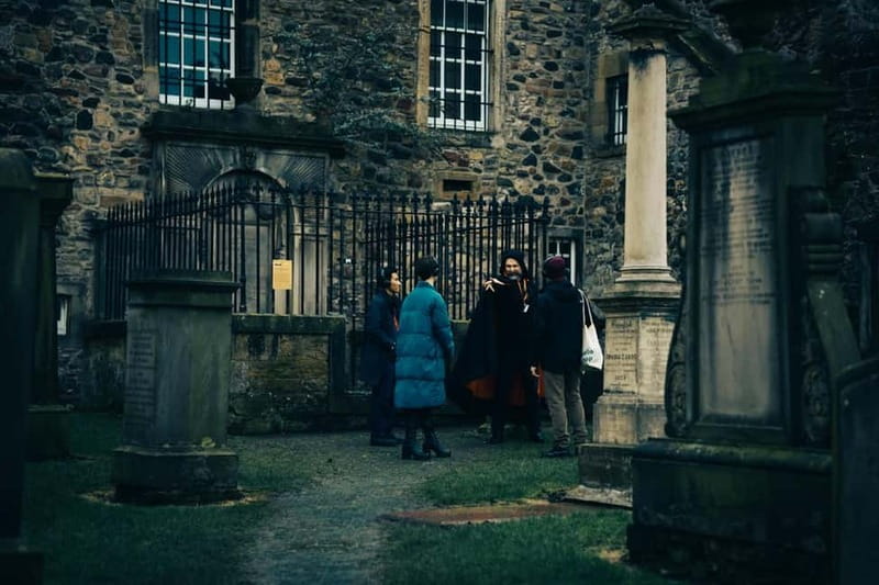 Edinburgh: Underground Vaults and Graveyard Evening Tour - From underground darkness to Canongate Graveyard