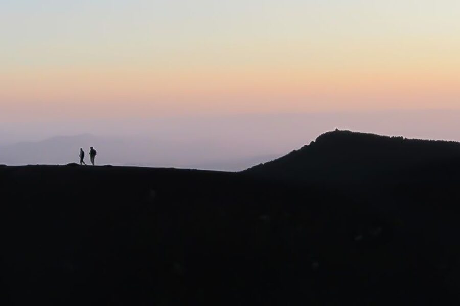 Etna Sunset Tour: Volcano trek, Cave & tasting from Catania - Walking across craters and fresh lava flows