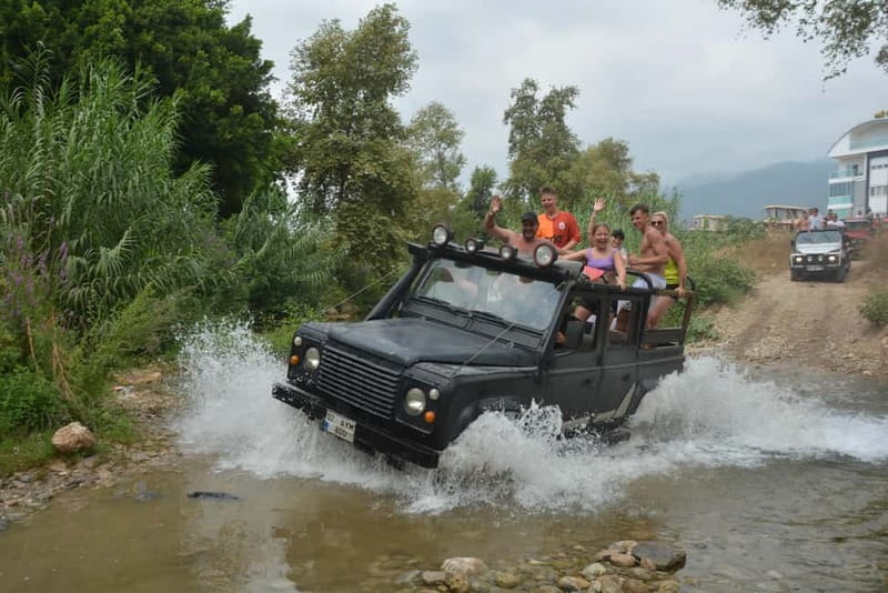 From Alanya: Jeep Safari with Lunch, Dim River & Cave - Water fights on the mountain road