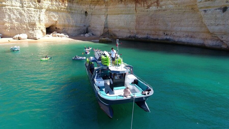 From Albufeira: Benagil Hidden Caves Tour by Kayak - A boat ride that puts Benagil in context