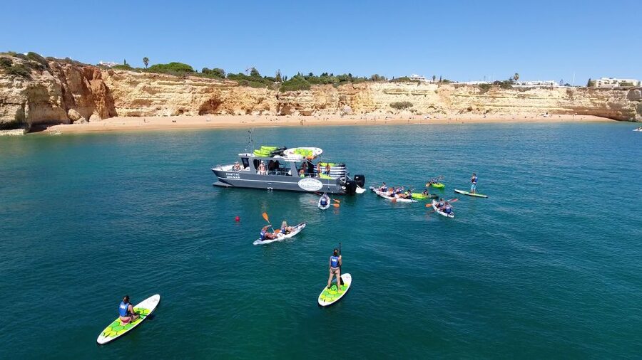 From Albufeira: Benagil Hidden Caves Tour by Kayak - Launching the kayaks near Praia da Marinha