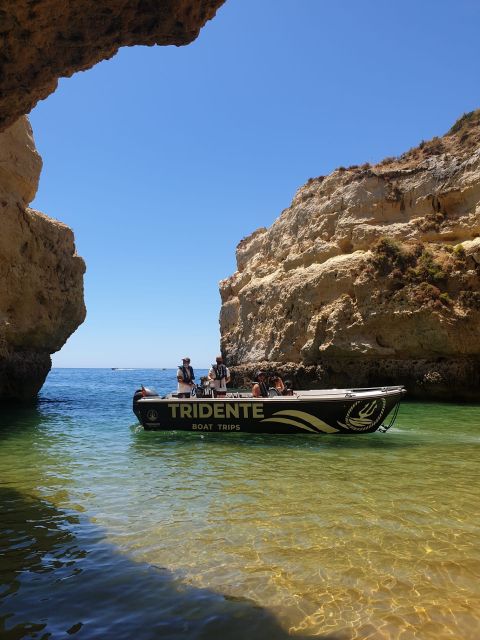From Armação de Pêra: Benagil Caves and Beaches Boat Tour - Praia dos Beijinhos and the first cliff caves