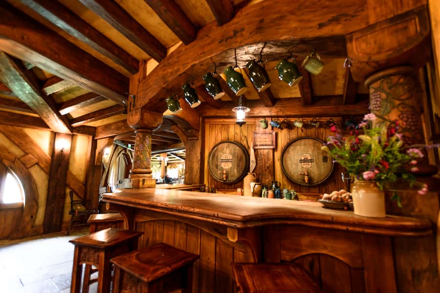From Auckland: Hobbiton & Waitomo Caves Day Trip with Lunch - Entering The Shire at Hobbiton